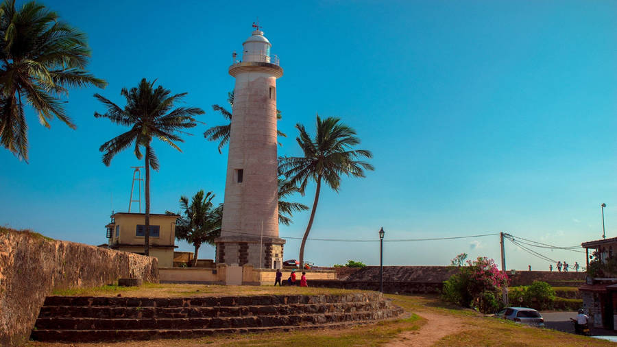 Majestic Galle Fort Lighthouse Standing Tall In Sri Lanka Wallpaper