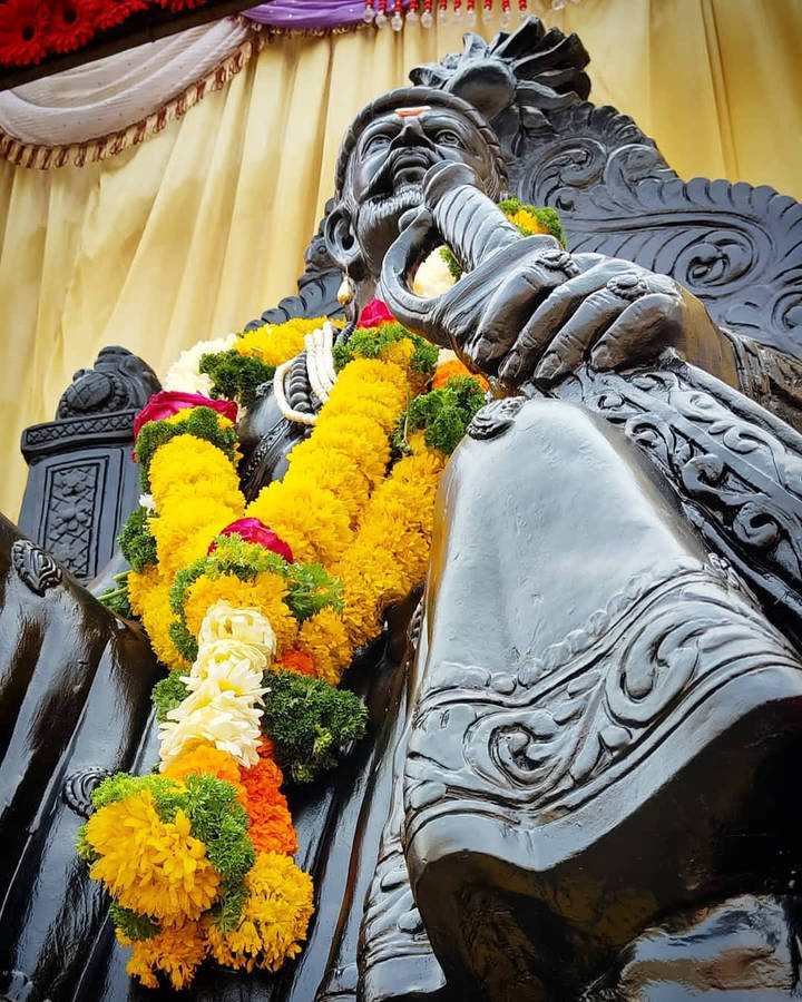 Majestic Low Angle Shot Of Chhatrapati Shivaji Maharaj Statue Wallpaper