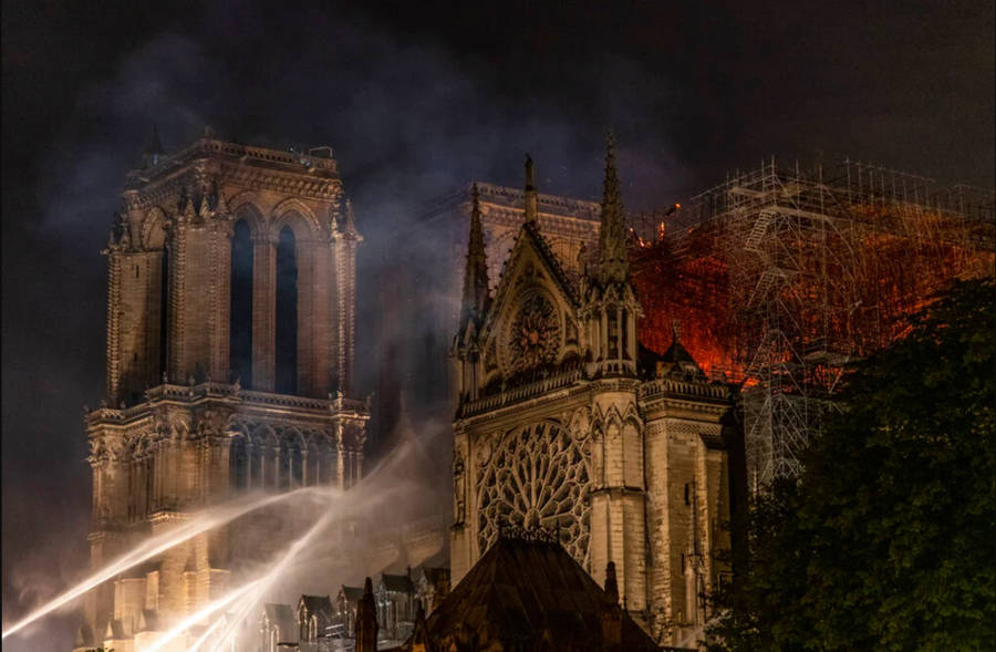 Majestic Notre-dame Cathedral Ablaze Wallpaper