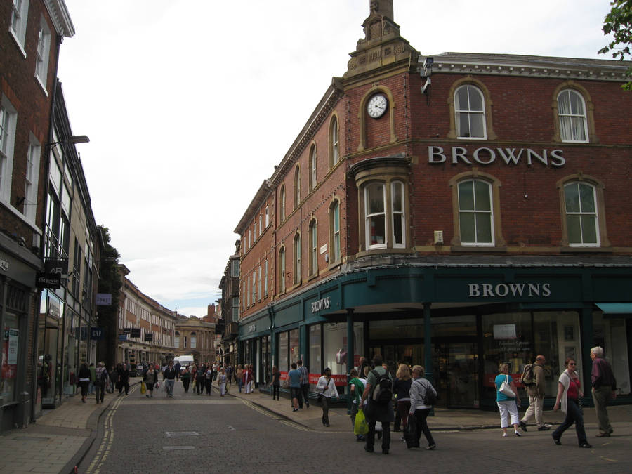 Majestic Panorama Of York Minister With Surrounding Archaic Architecture Wallpaper