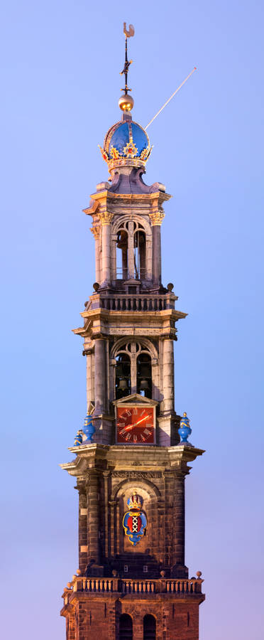 Majestic Peak Of Westerkerk Tower In Amsterdam Wallpaper