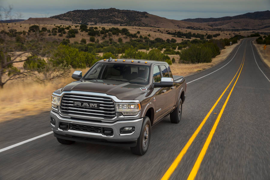 Majestic Ram Truck On A Long Drive Wallpaper