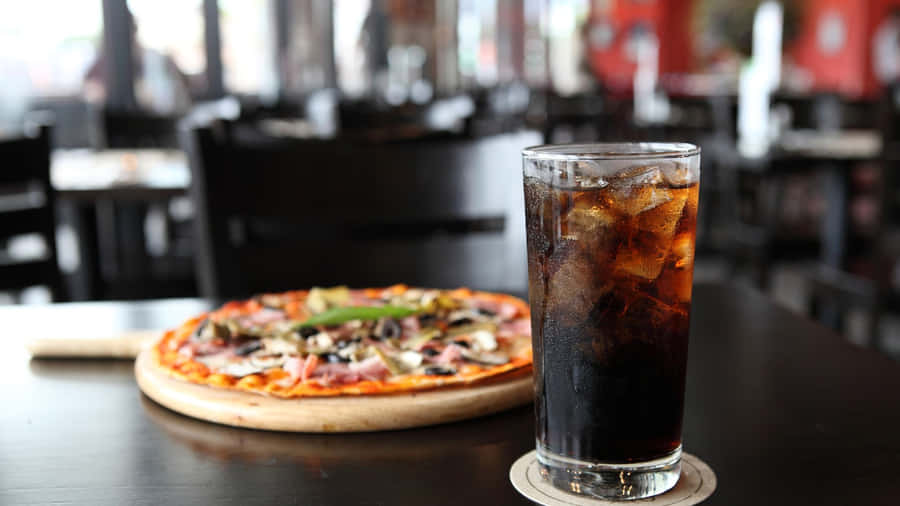 Majestic Snowy Mountains And Calm River Landscape Wallpaper