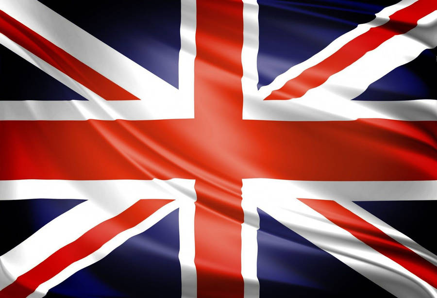 Majestic United Kingdom Flag In A Dark Setting Wallpaper