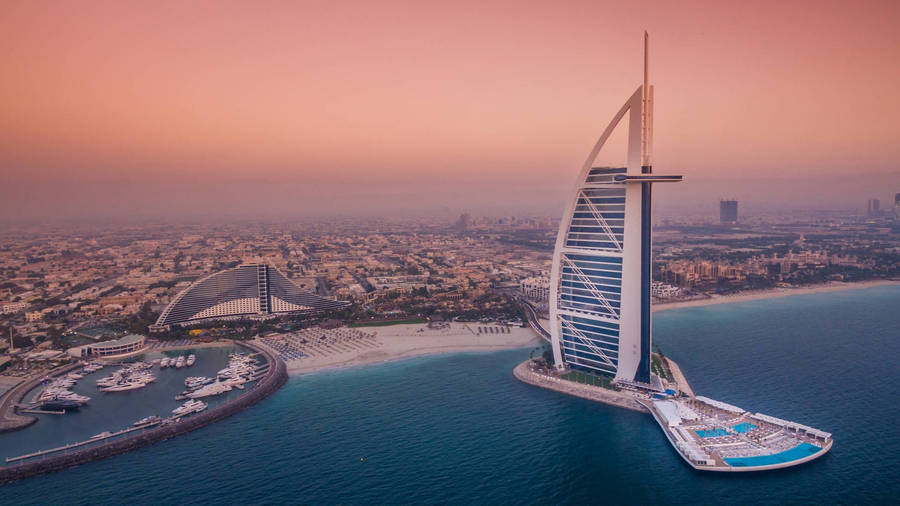 Majestic View Of The Burj Al Arab In All Its Glory Wallpaper