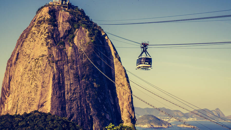 Majestic Vista Of Rio De Janeiro's Sugarloaf Mountain Wallpaper