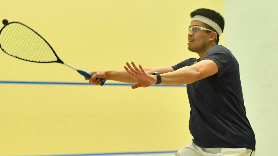 Man With Headband Playing Squash Wallpaper