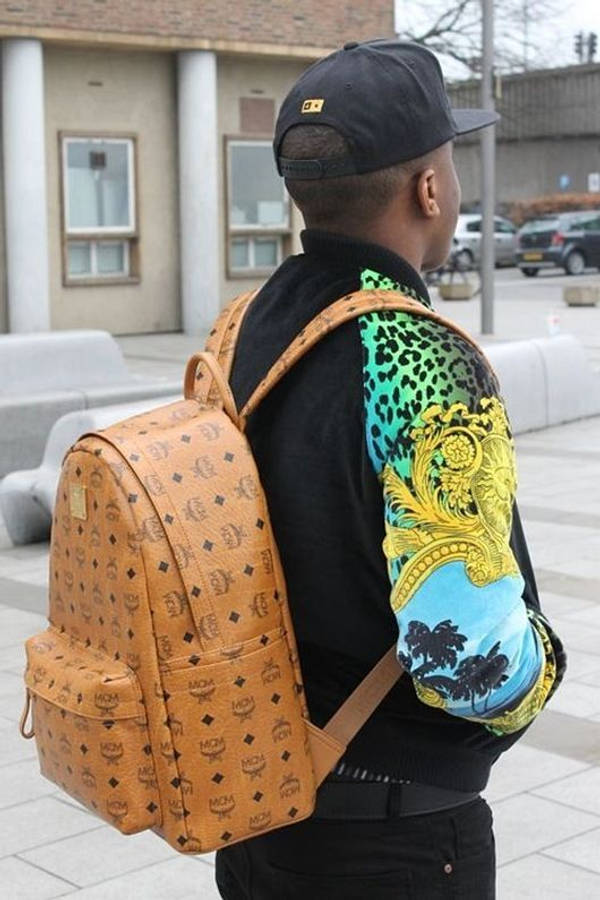 Man With Mcm Backpack Wallpaper