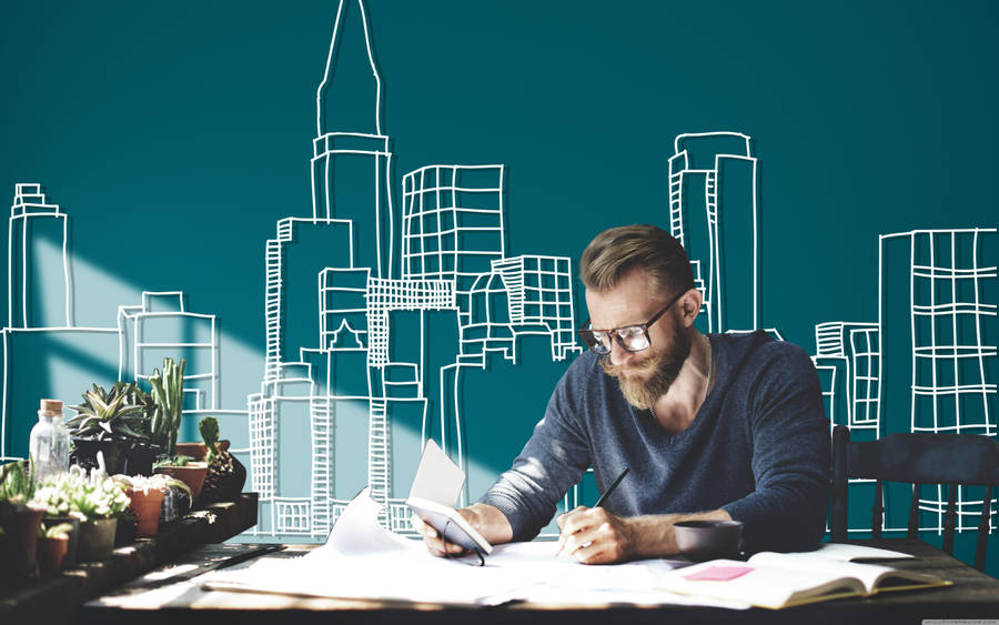 Man Working In Table Wallpaper