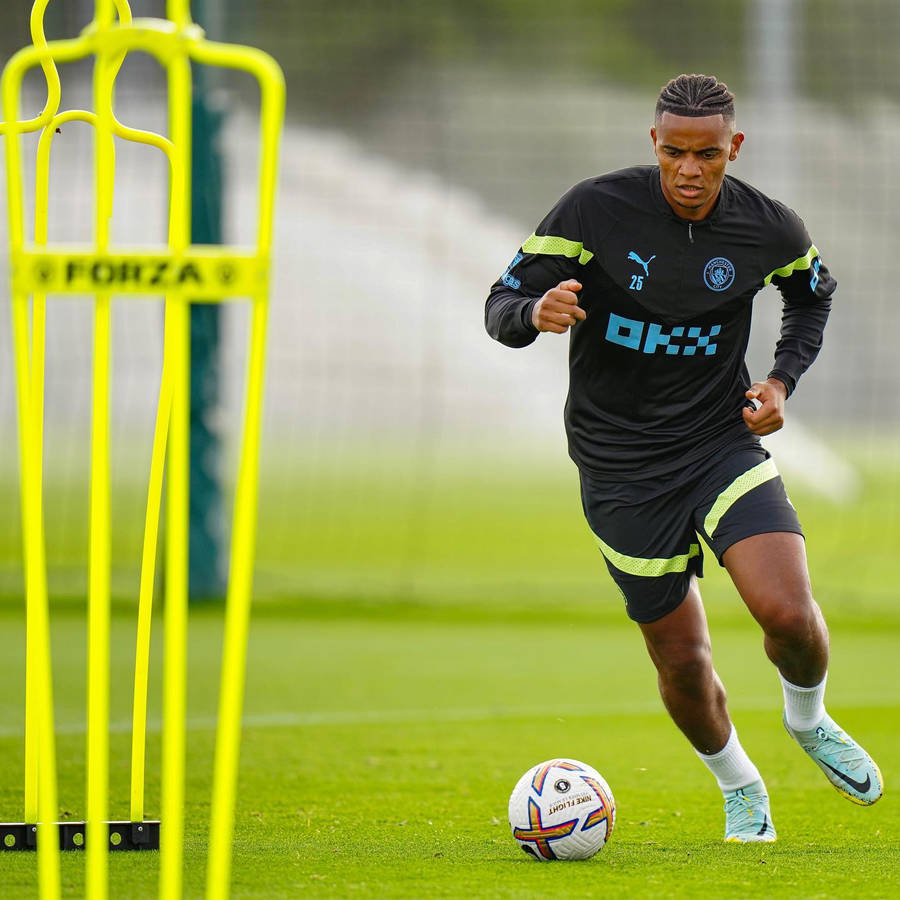 Manuel Akanji And Training Dummy Wallpaper