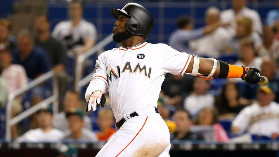 Marcell Ozuna After Hitting A Ball Wallpaper