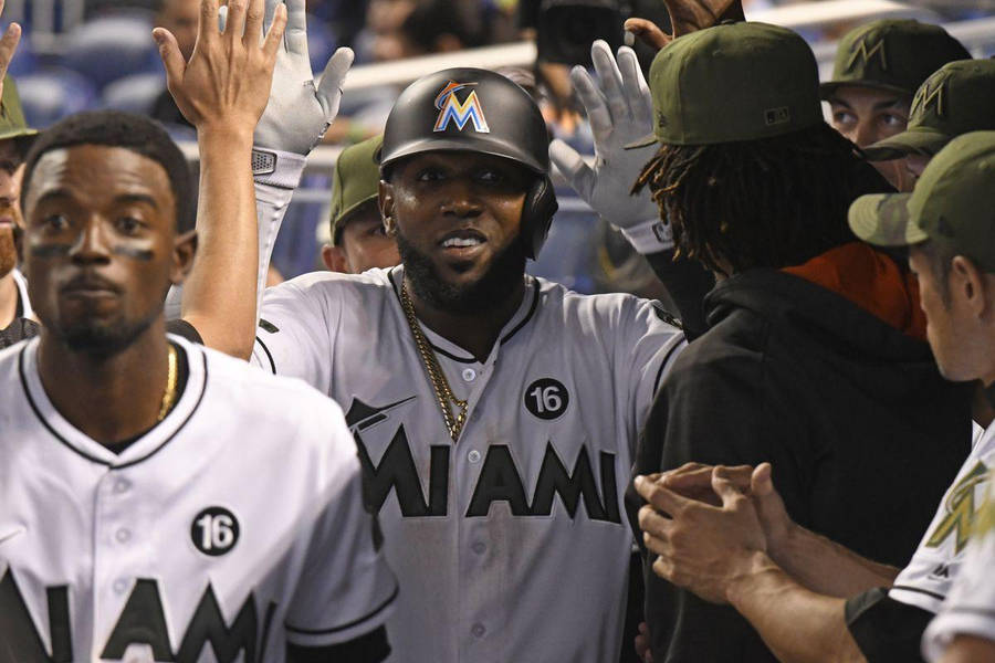 Marcell Ozuna Giving High Fives Wallpaper