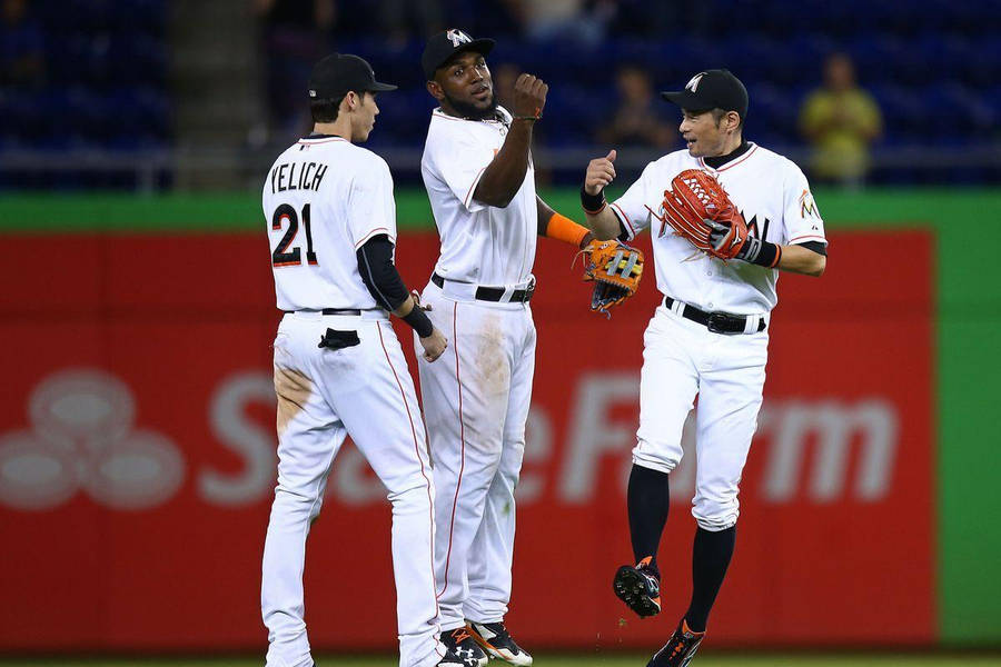 Marcell Ozuna With Two Teammates Wallpaper