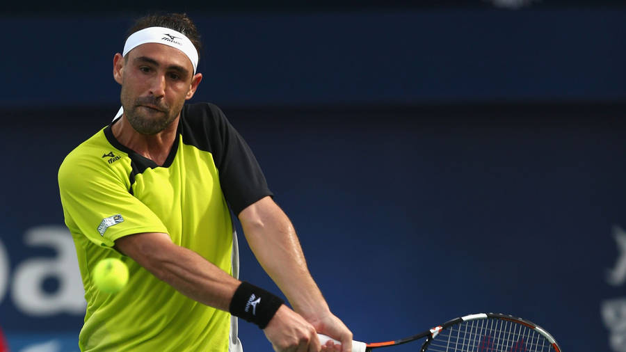 Marcos Baghdatis Intensely Gripping His Tennis Racket Wallpaper