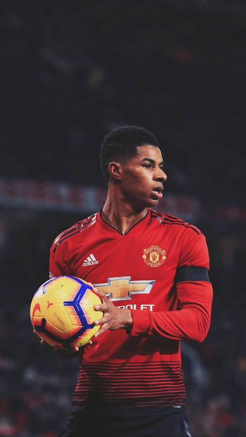 Marcus Rashford Holding Ball Wallpaper