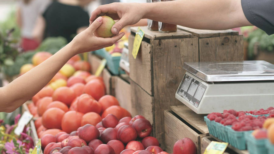 Market Hands Holding Fruit Wallpaper