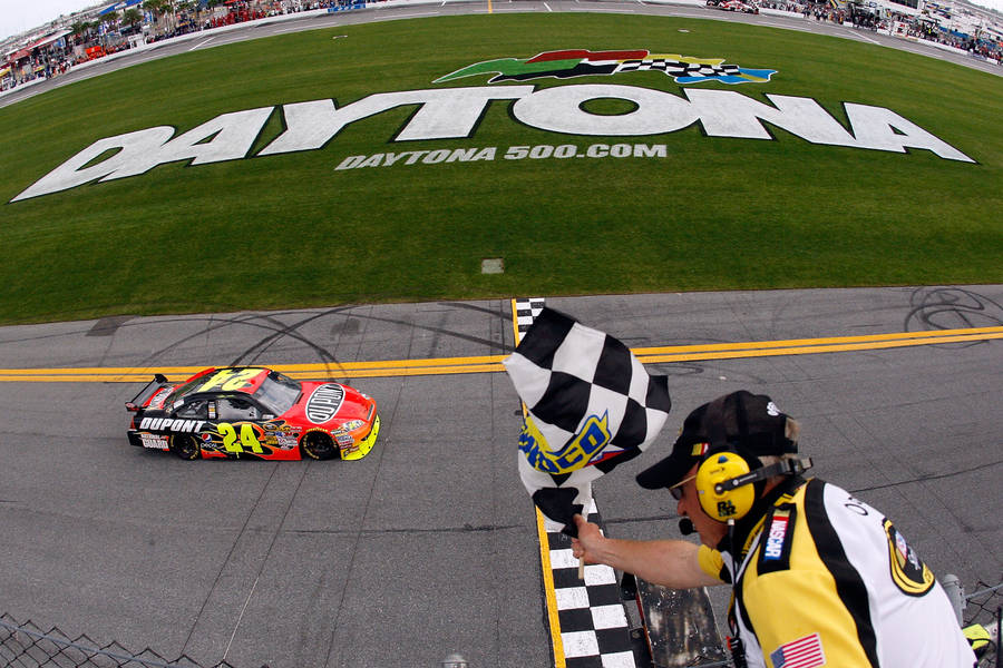 Marshal Waving A Checkered Flag Wallpaper