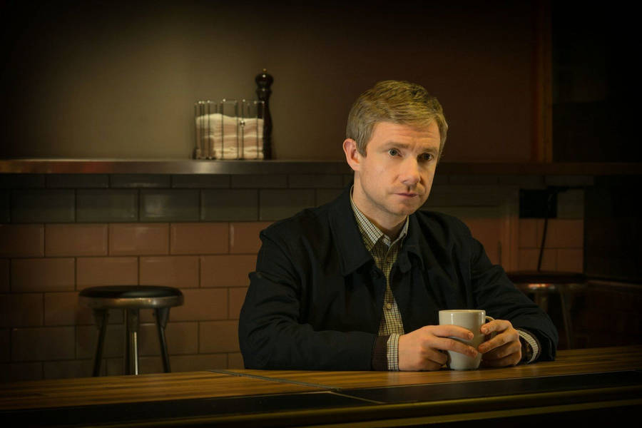 Martin Freeman Holding Cup Wallpaper