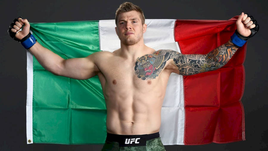 Marvin Vettori Posing With Italian Flag Wallpaper