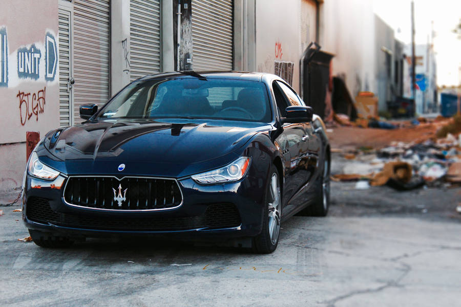 Maserati Car On Alleyway Wallpaper