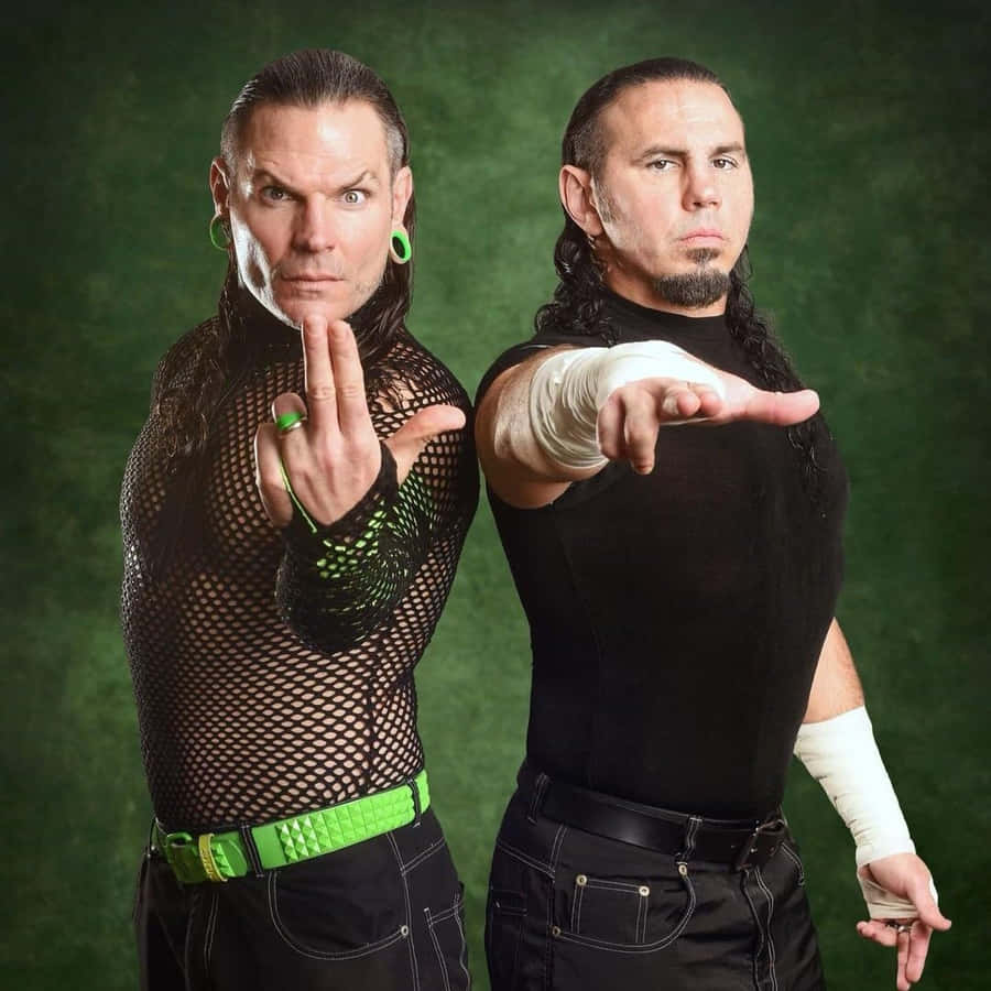 Matt Hardy And Jeff Hardy In Aew Wrestling Action Wallpaper