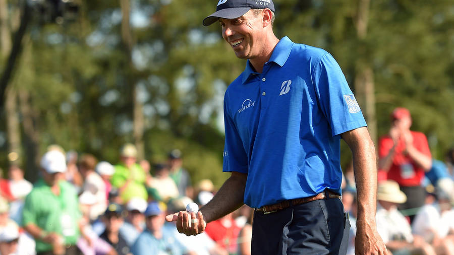 Matt Kuchar Smiling And Holding Ball Wallpaper