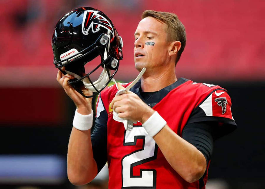 Matt Ryan Fixing A Helmet Wallpaper