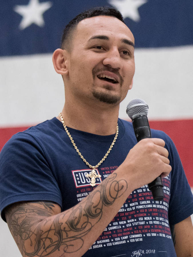 Max Holloway With Microphone Wallpaper