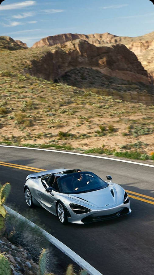 Mclaren 720s Aerial View On Road Phone Wallpaper