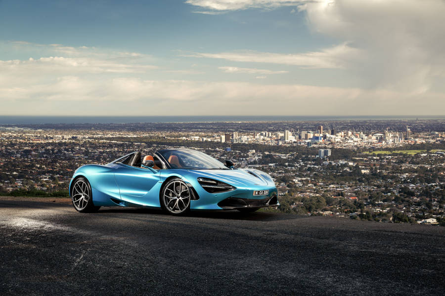 Mclaren 720s Blue Cityscape Wallpaper