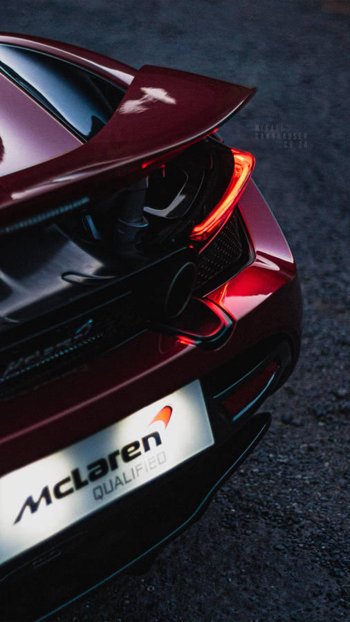 Mclaren 720s Phone Trunk And Plate Wallpaper