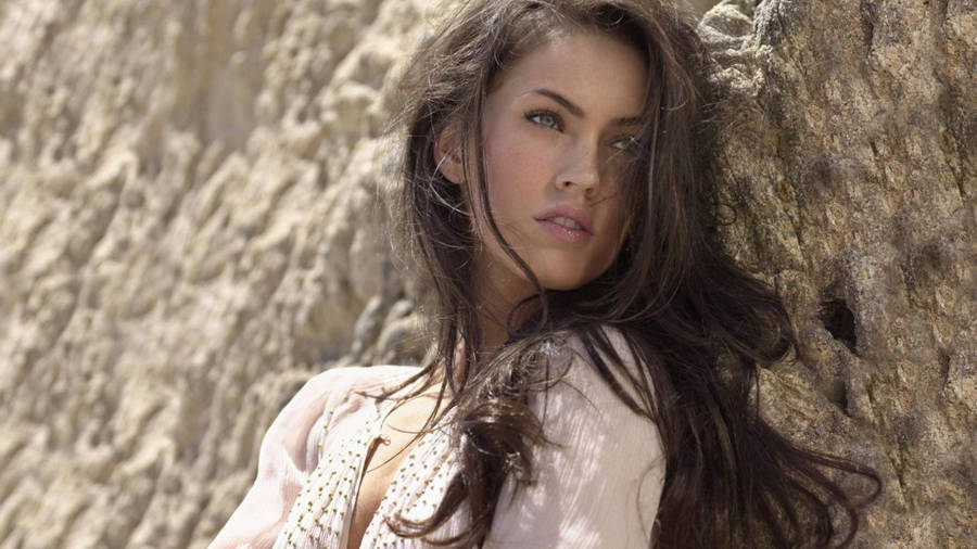 Megan Fox Brunette On Rock Wallpaper