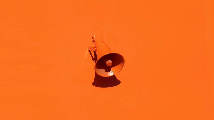 Megaphone On Orange Background Wallpaper