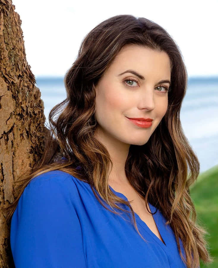 Meghan Ory Blue Dress Seaside Portrait Wallpaper