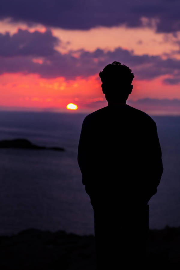 Melancholy Man And Sunset Wallpaper