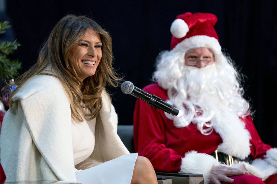 Melania Trump With Santa Claus Wallpaper