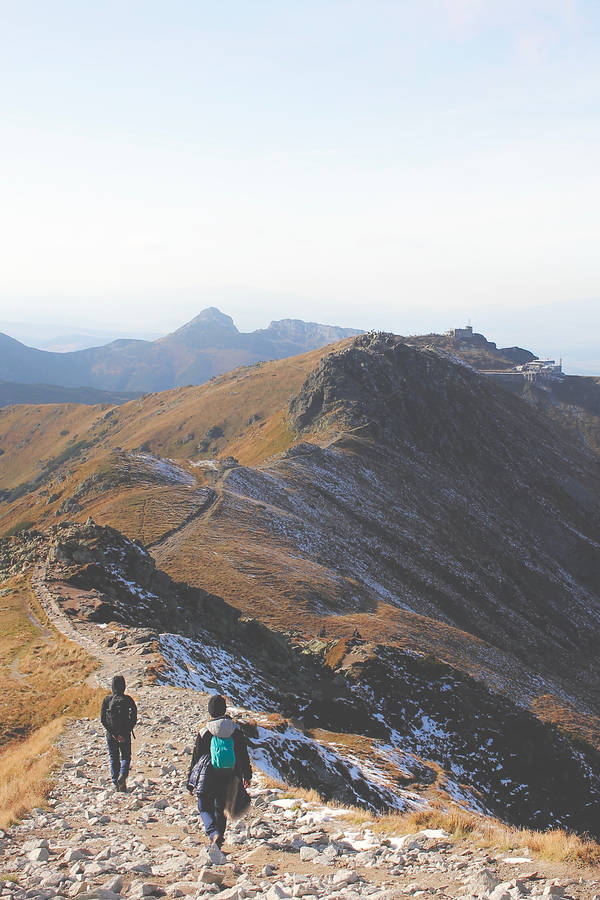 Men In Slovakia Mountain Peak Wallpaper