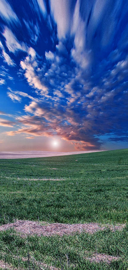 Mesmerizing Sunset Above The Horizon Wallpaper