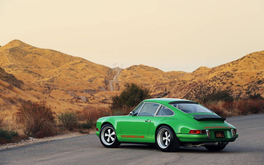 Metallic Green Singer Porsche Wallpaper