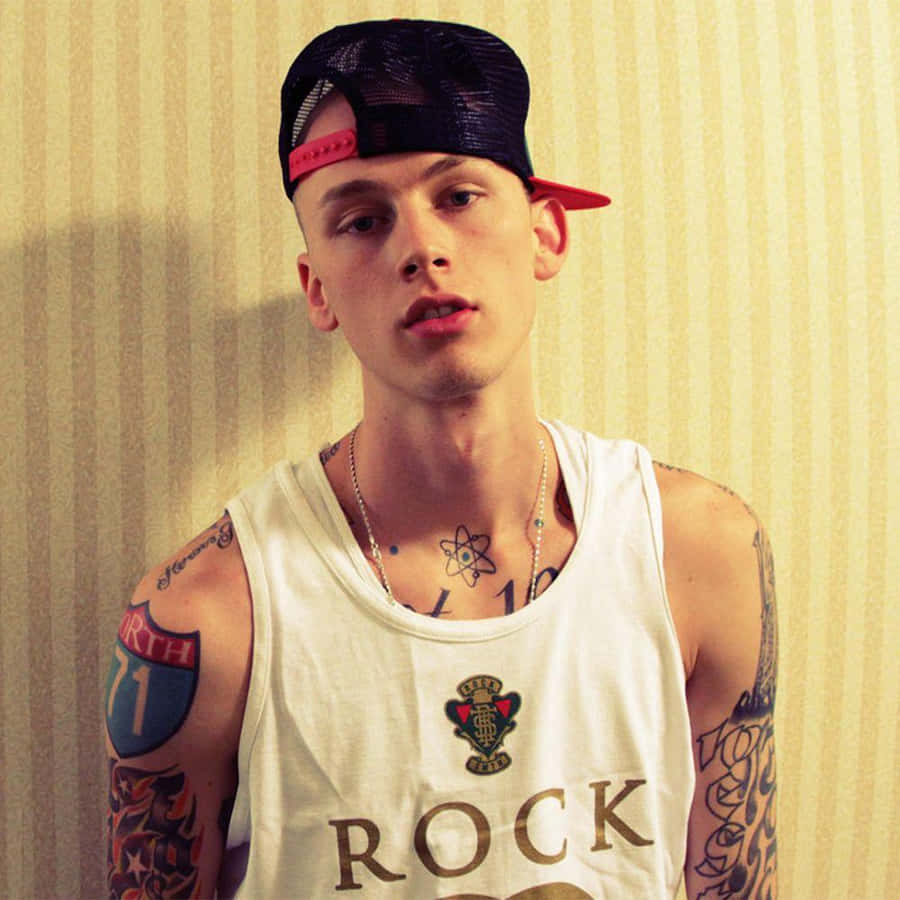 Mgk Rocking Out On The Stage Wallpaper