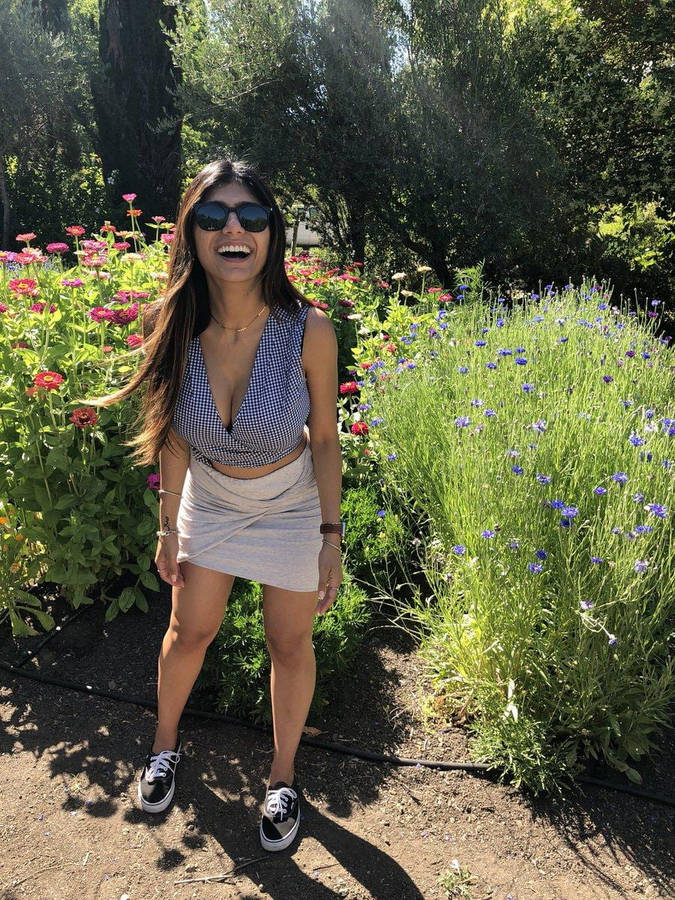 Mia Khalifa In A Garden Wallpaper