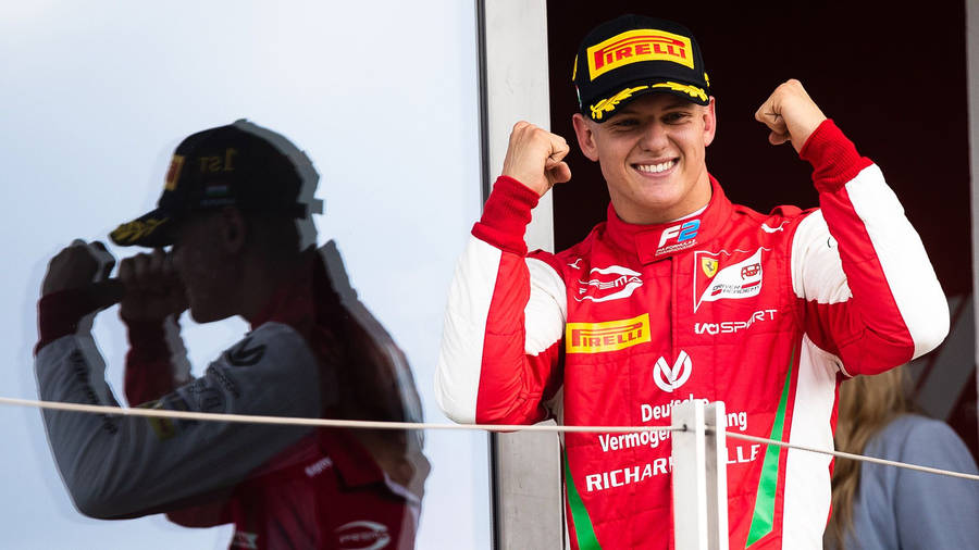 Mick Schumacher Raised Fists Wallpaper