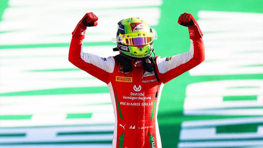 Mick Schumacher With Fists Up Wallpaper