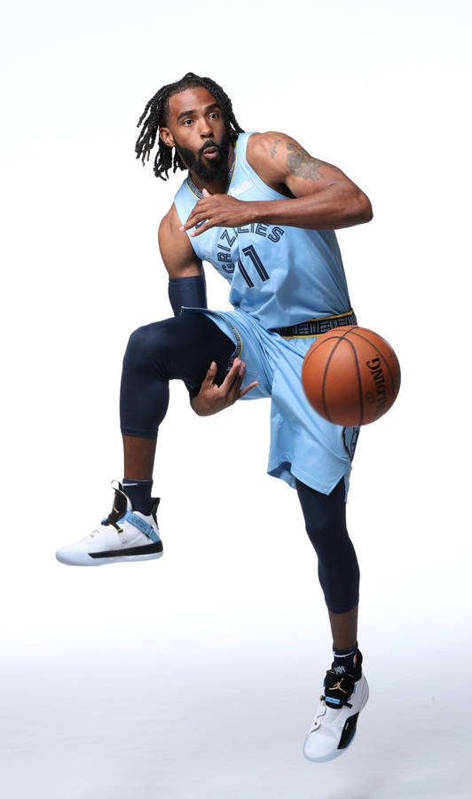 Mike Conley Memphis Grizzlies Action Portrait Wallpaper