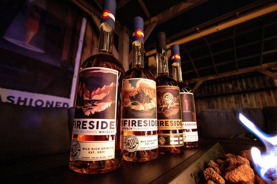 Mile High Spirits - Fireside Whiskey In Its Glory Wallpaper