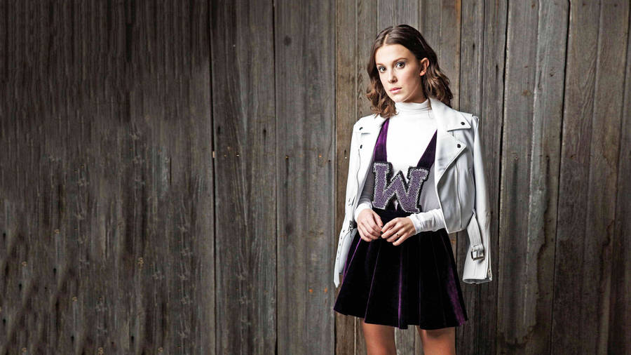 Millie Bobby Brown In White Leather Jacket Wallpaper