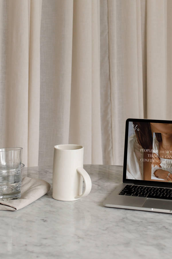 Minimalist Coffee And Laptop On Marble Wallpaper