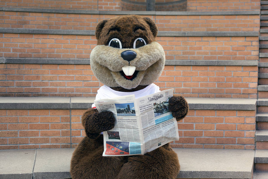 Mit Mascot With Newspaper Wallpaper