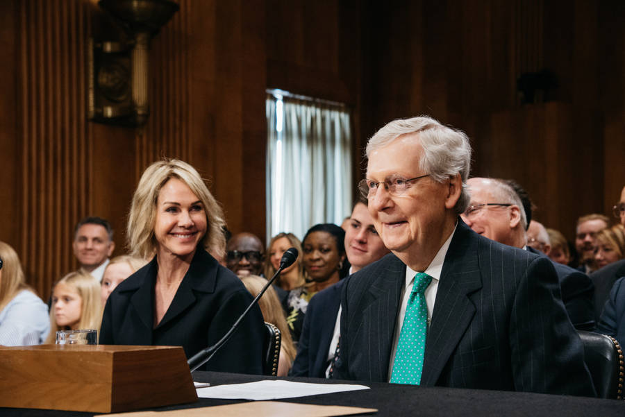 Mitch Mcconnell Sitting Next To Kelly Craft Wallpaper