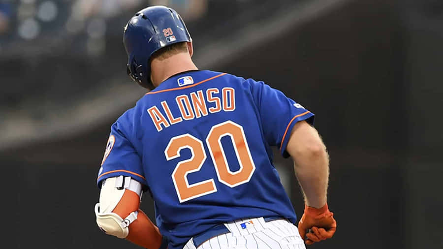 Mlb Rookie Pete Alonso Smiling After Batting Home Run Wallpaper